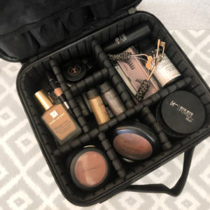 makeup inside makeup bag with adjustable compartments